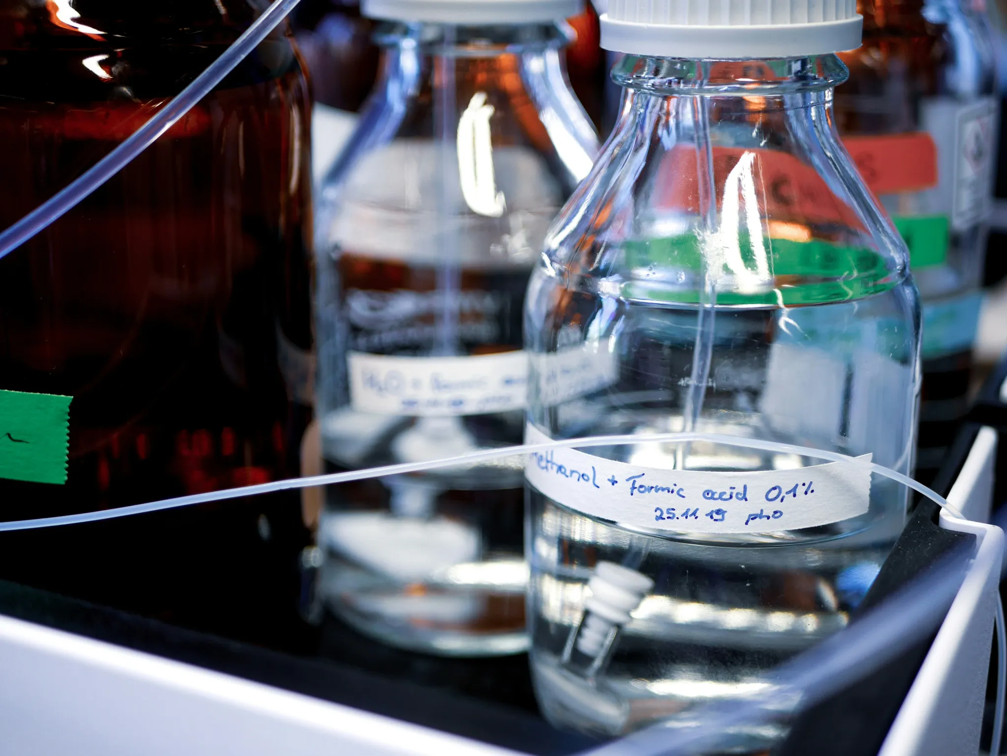 clear glass bottles on white table