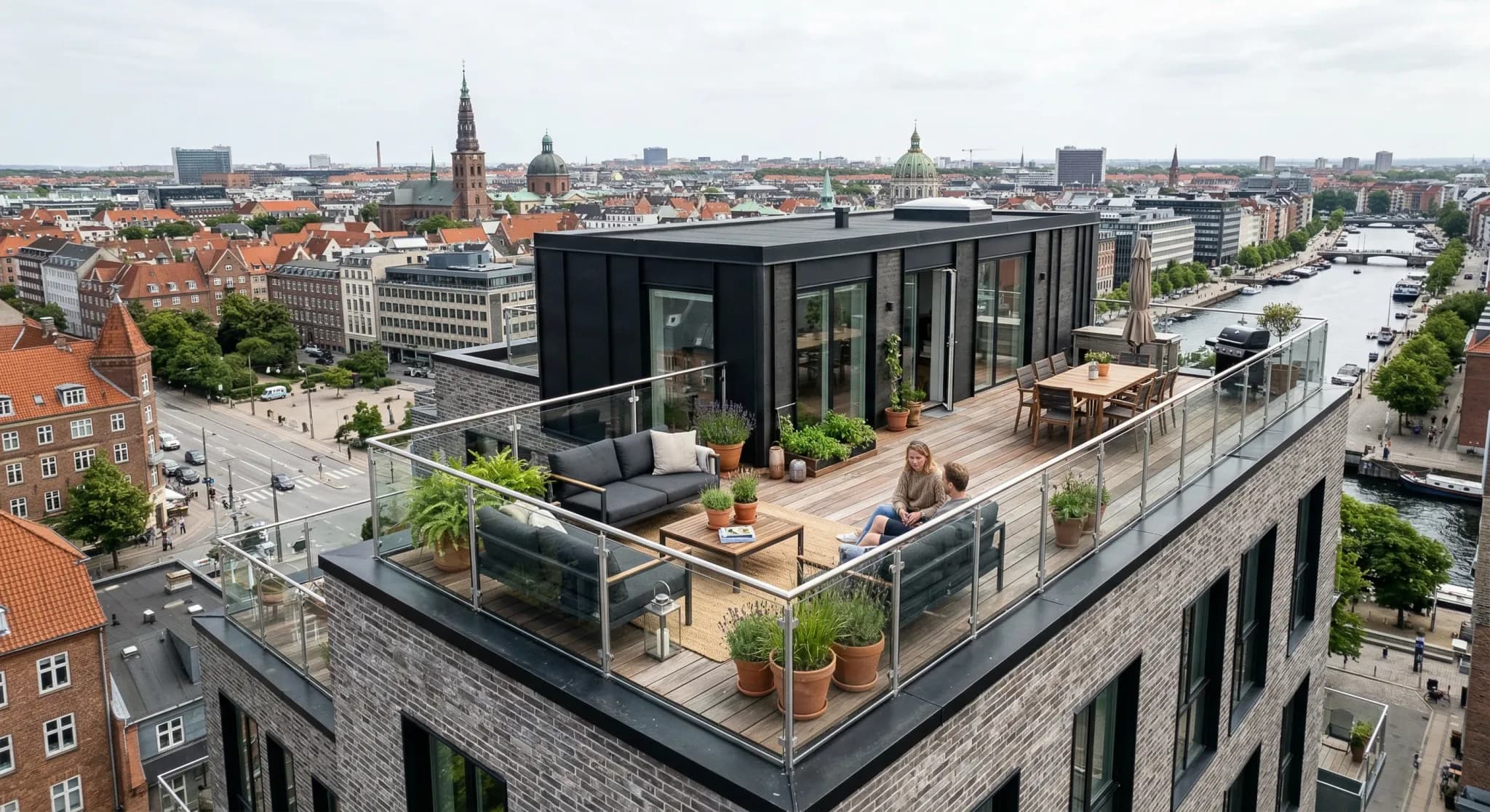 A photorealistic high-angle view of a modern roof terrace with wooden decking and glass balustrades on a contemporary brick building. The scene is captured during a bright, overcast day in a Northern